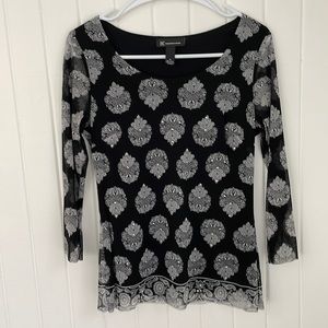 Black and white print top with a little sparkle.
